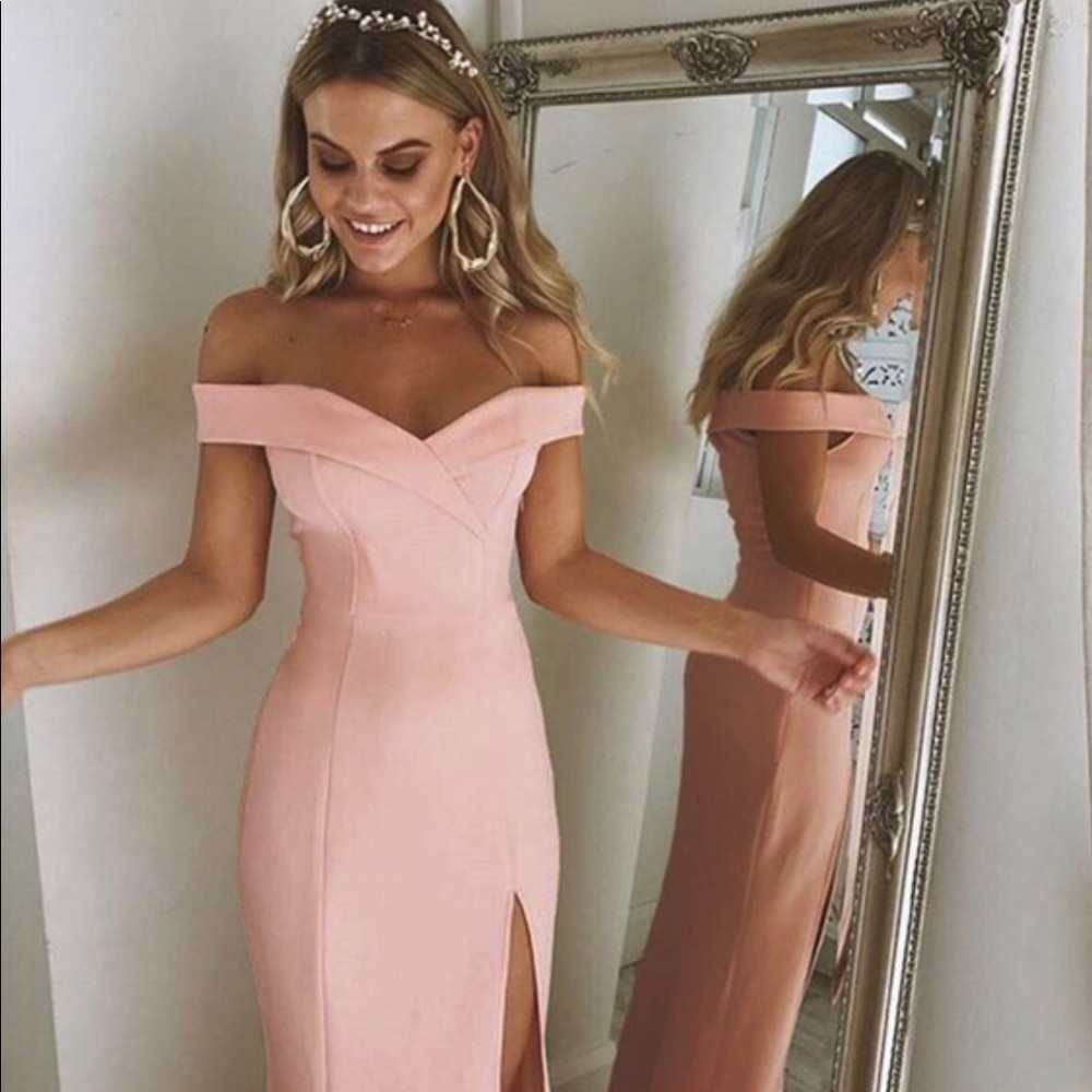 Woman’s off-the-shoulder formal evening gown dress